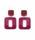 Fuchsia roze oorclips met een vierkant design