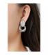 Oorclips | Goudkleurige oorclips met witte cat eye steen | Elegante clip-on oorbellen