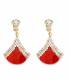 Oorclips | Goudkleurige oorclips met rood accent | Elegante oorclips met strass