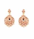 Goudkleurige oorclips met rose-gold kleurige glas steentjes