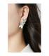 Zilverkleurige oorclips met parel | Trendy fashion