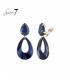 Blauwe oorclips met een marmeren look en glas steentje