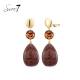 Oorclips bruin met warme herfsttinten en luxe glans