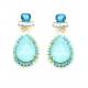 Oorclips met turquoise druppel steen en blauwe kristallen